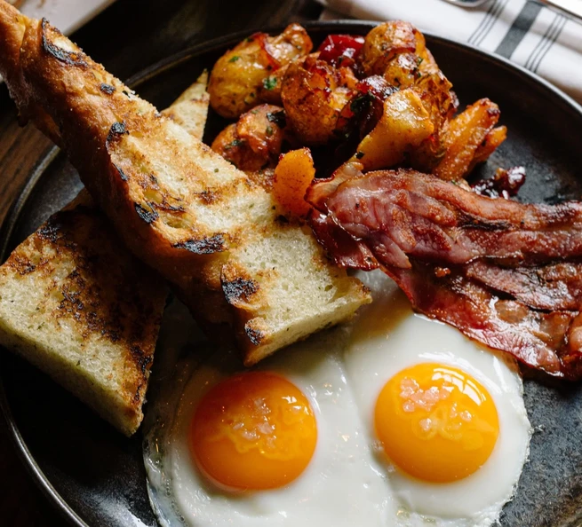 Wood-fired seasonal skillet served at our Montgomery Calgary steakhouse