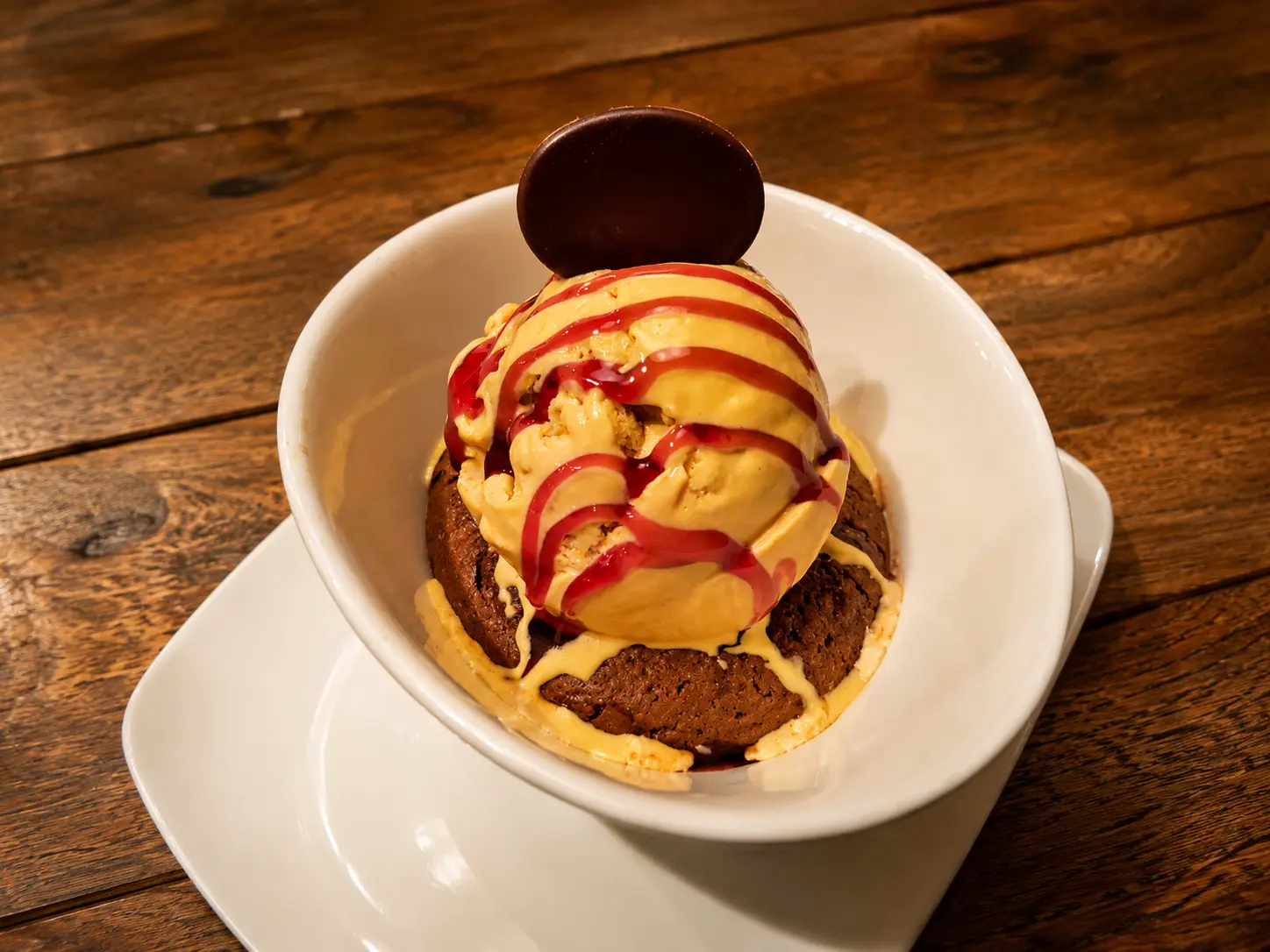 Warm chocolate pudding with salted caramel ice cream at NOtaBLE - The Steakhouse in Calgary, AB